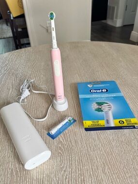 Oral-B pro 1000 rechargeable pink & white electric toothbrush
